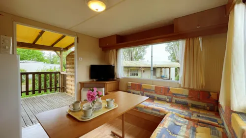 Mietunterkunft - Vintage Mobilhome Cottage Continental 2 Bedrooms Covered Terrace - image n°2 - Camping de la Belle Etoile