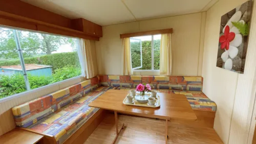 Mietunterkunft - Vintage Mobilhome Cottage Continental 2 Bedrooms Covered Terrace - image n°3 - Camping de la Belle Etoile