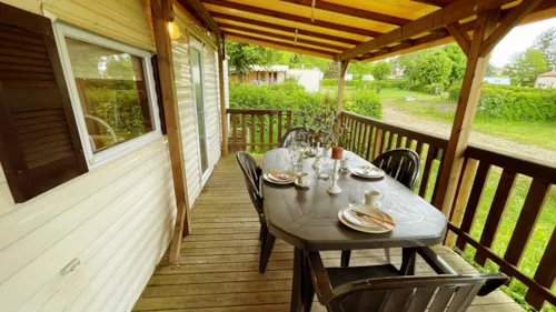 Mietunterkunft - Vintage Mobilhome Cottage Continental 2 Bedrooms Covered Terrace - image n°4 - Camping de la Belle Etoile