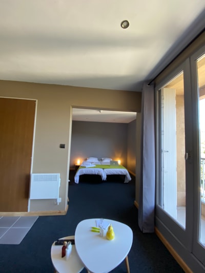 Hotel room for 1 to 4 people, linen kit provided, beds not made, towel provided