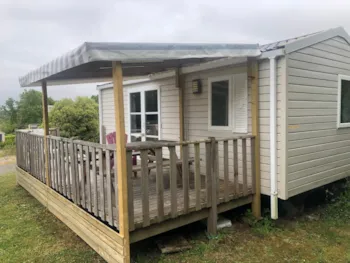Mietunterkunft - Mobilheim Lodge 64 24.5 M² - 2 Zimmer- Halbüberdachte Terrasse - Camping Gouelet Ker