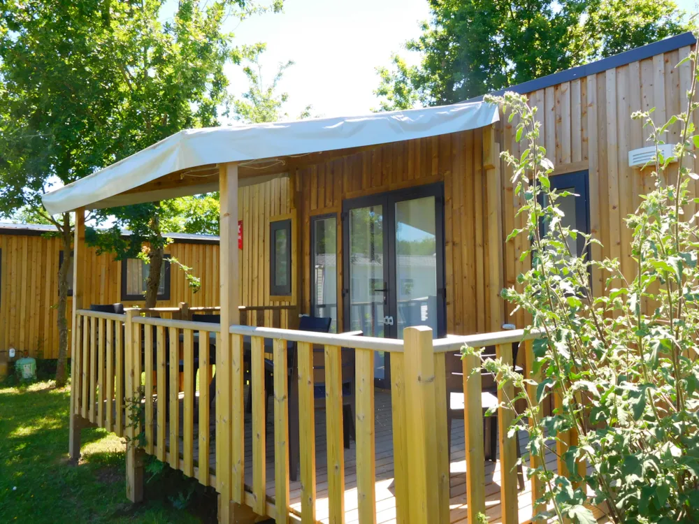 Mietunterkunft - Mobilheim 3 Leaves ☘️ 3 Zimmer + Halbüberdachte Terrasse - Campilô