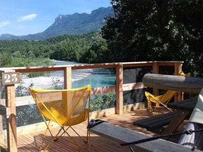Trapper cabin overlooking the river with mountain views
