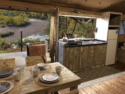 Luxury lodge nature tent with river view