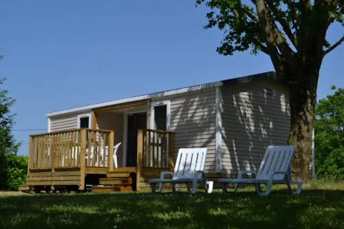 Location - Mobil-Home Premium 35M² 2 Chambres + Terrasse Semi-Couverte + Tv + Lv + Clim - image n°2 - Flower Camping Les Plages de l'Ain