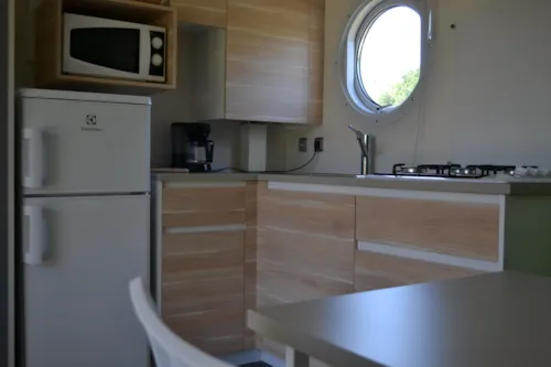 Location - Mobil-Home Premium 35M² 2 Chambres + Terrasse Semi-Couverte + Tv + Lv + Clim - image n°5 - Flower Camping Les Plages de l'Ain