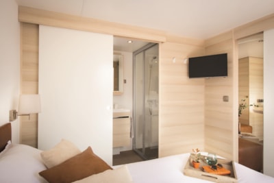 Mobile-home Prémium 40m² 3 bedrooms + Half-covered terrace + TV + air-conditioning