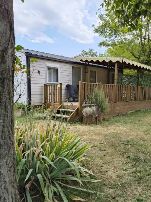 Location - Mobil-Home Premium 35M² 2 Chambres + Terrasse Semi-Couverte + Tv + Lv + Clim - image n°8 - Flower Camping Les Plages de l'Ain