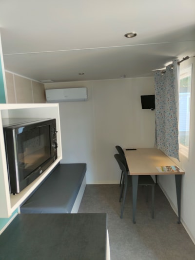 Mobile-home Confort 20m² 1 bedroom + sheltered terrace + TV + air-conditioning