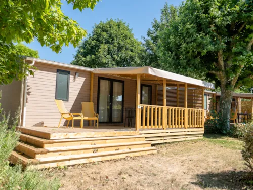 Location - Mobil-Home Premium 35M² 2 Chambres + Terrasse Semi-Couverte + Tv + Lv + Clim - image n°1 - Flower Camping Les Plages de l'Ain