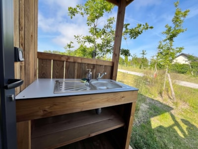 PREMIUM PACKAGE - private bathroom facilities (shower, toilet, sink), outdoor kitchen, electricity