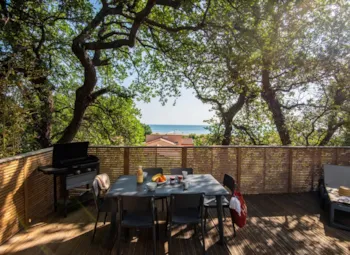 Mietunterkunft - Sirène 2 Meersicht (2 Schlafzimmer, 25M²) Terrasse, Klimaanlage - Camping Le Bois de Valmarie