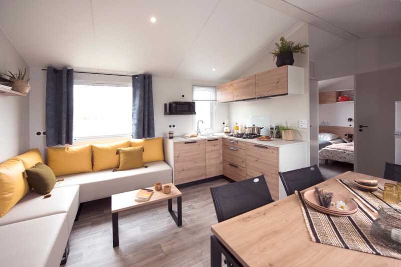Mobil-home Premium Aëla 40m² - 4 chambres - 2 salles de bain + Terrasse couverte + Clim + TV + LV