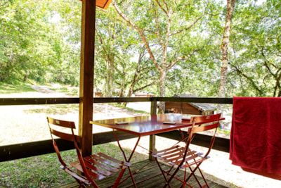 Standard wooden ecolodge 12 to 17m² (1 bedroom) + 4m² covered terrace (without bathroom facilities)