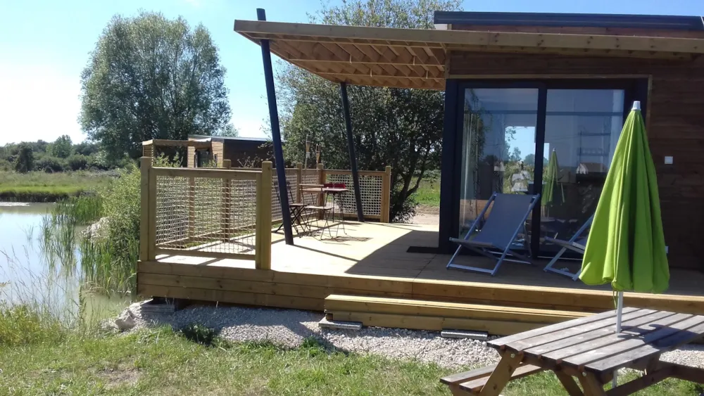 Cottage Bord d'étang Premium 32m² (2 chambres) + terrasse 15m²