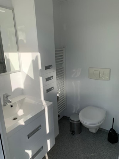 Private sanitary + 16 amp power + TV connection + free WiFi + private water tap and drain