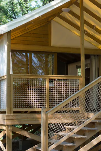 Mietunterkunft - Holzhütte Luxe (2 Zimmer) - 5. Person: Kind Unter 10 Jahren - Camping Les Cent Chênes