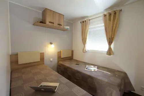 Mietunterkunft - Mobilheim 24.9M² - 2 Schlafzimmer - image n°5 - Camping L'Ardéchois