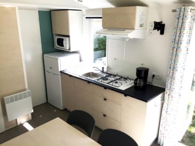 Comfort mobile home with 2 bedrooms, 24 m² + air conditioning + TV + Wi-Fi + terrace