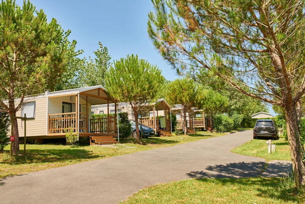 Huuraccommodatie(s) - Starcarvan Rhunea 2Ch Premium  - Terrasse Intégrée - Camping la Ferme des 4 Chênes