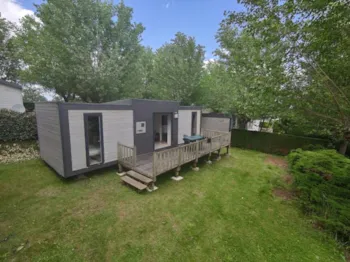 Mietunterkunft - Taos 2 Ch 2 Sdb 2Wc Clim -  5P - Camping la Ferme des 4 Chênes