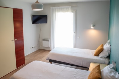 Studio with Twin Beds & Balcony — 1