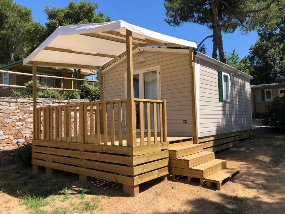 Cottage Premium 20m² - (1 ch) + clim + terrasse couverte + lave vaisselle + TV + linge de maison