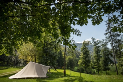 Standard pitch for a tent with mountain view