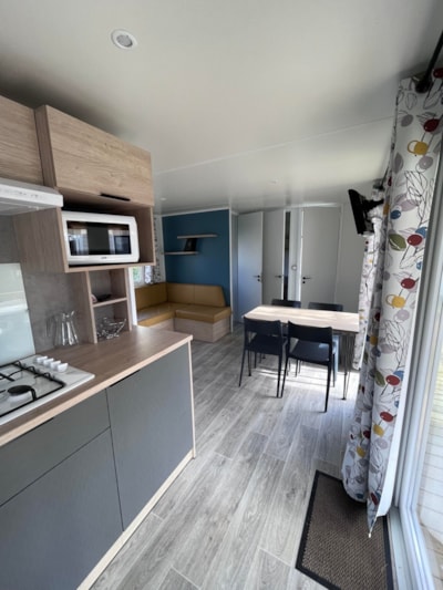 Mobile-home - PRIVILEGE - 2 Bedrooms - TV - with semi-covered terrace (Sunday/Sunday)