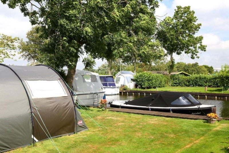 tent site with boat pontoon