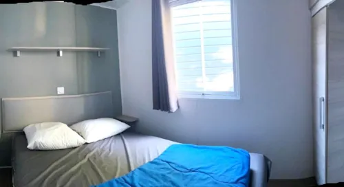 Location - Les Conforts - Mobilehome 4 Personnes 2 Chambres Dim/Dim * - image n°4 - Camping Paradis Family des Issoux