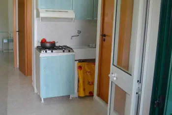 Mietunterkunft - Bungalow 3 Räume - Camping Village Baia San Nicola
