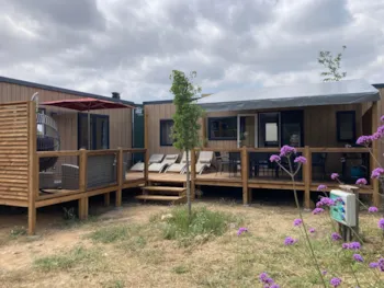 Huuraccommodatie(s) - Stacaravan Tribu Premium 5 Slaapkamers + Terras 44M² + Tv + Vaatwasmachine +Airconditioning - Flower Camping Olivigne