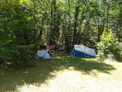 Pitch tent , caravan or motor home