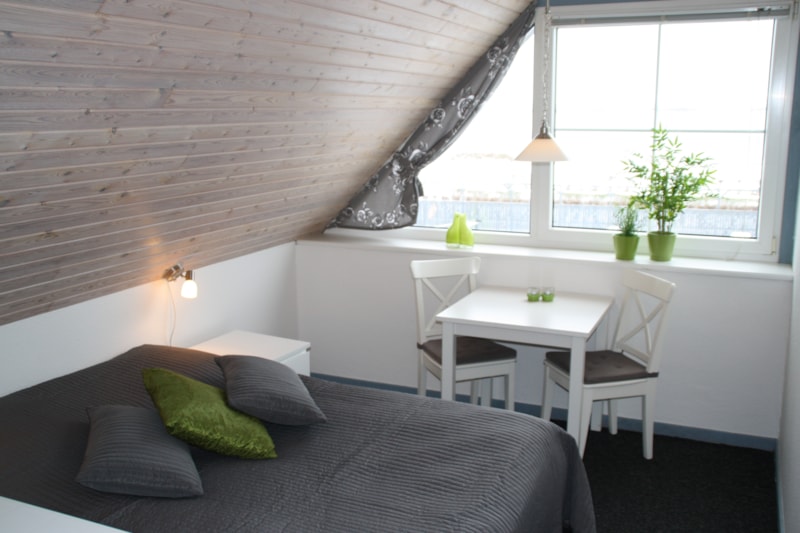 Double Bedroom with private toilet & bath