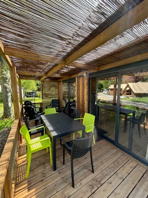 Location - Chalet Le Grand Som - 7 - Clim - image n°2 - Camping L'Arc-en-Ciel
