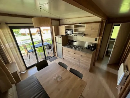 Location - Chalet Le Grand Som - 7 - Clim - image n°3 - Camping L'Arc-en-Ciel