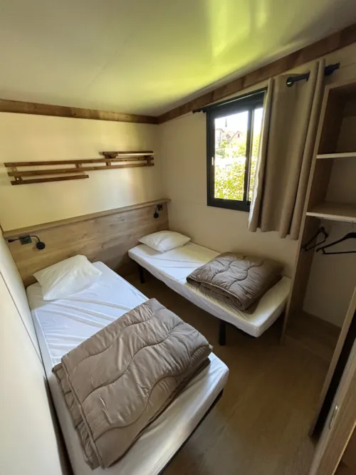 Location - Chalet Le Grand Som - 7 - Clim - image n°5 - Camping L'Arc-en-Ciel