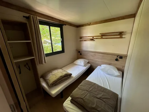 Location - Chalet Le Grand Som - 7 - Clim - image n°6 - Camping L'Arc-en-Ciel