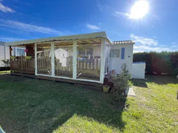 Location - Mobil Home Confort Tribu Sous-Loc - 35M² - Clim. - 3 Chambres - Terrasse Couverte  - - Camping Ushuaïa Villages La Maïade
