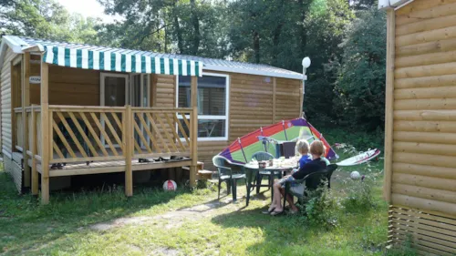 Location - Mobile Home Confort Riviera 32M² - 3 Chambres + Terrasse Semi-Couverte 15M² + Tv - image n°3 - Flower Camping Ser Sirant