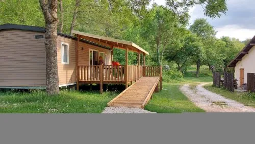 Location - Mobil Home Life Confort Pmr 32M² - 2 Chambres + Terrasse Couverte 18M² + 2 Tv - image n°2 - Flower Camping Ser Sirant