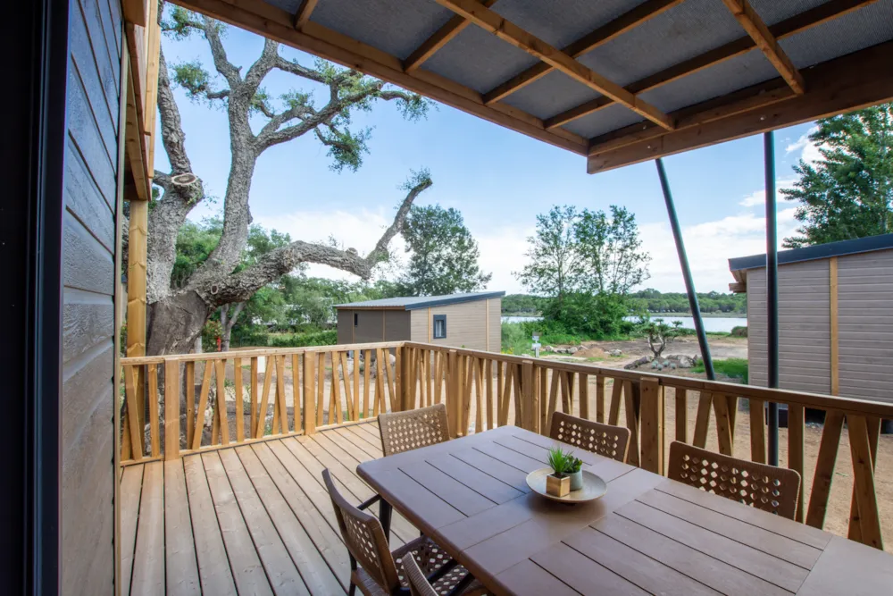 Huuraccommodatie(s) - Chalet Sunnionu Met Dak + Vijverzicht Exclusive - Camping U Pinarellu