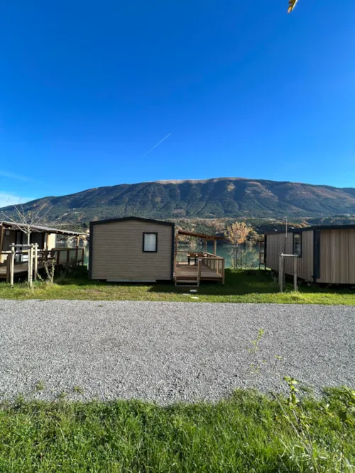 Mietunterkunft - Mobilheim Grand Large Confort Am See, 2 Schlafzimmer, 1 Badezimmer - image n°8 - Camping D'Herbelon