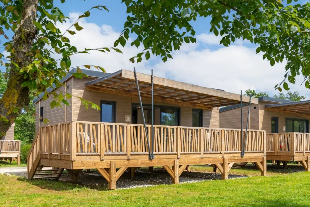 Mietunterkunft - Chalet 2 Zimmer Seeufer **** - Camping Sandaya Le Carbonnier