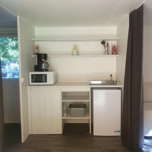 Mietunterkunft - L'evasion Quatro (Ohne Wasser, 2 Schlafzimmer, 16 M²) 🌺🌺🌺🌺 - image n°3 - Camping Le Bois de Cornage