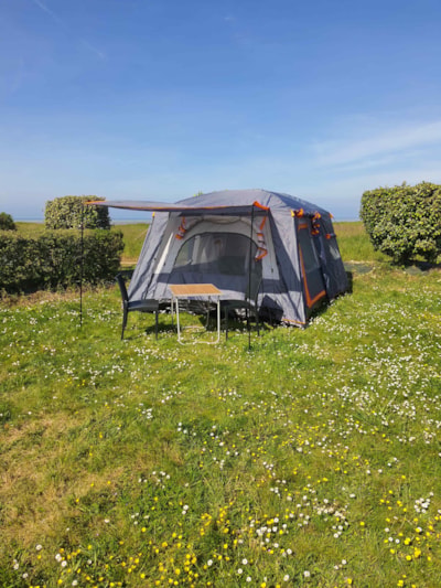 Pitch with a tent and sleeping arrangement. — 1