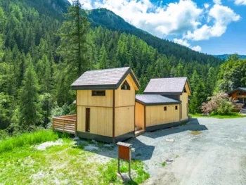Mietunterkunft - Gamme Chrystal - Chalet Le Nid 20 M² - 1 Schlafzimmer, Sitzecke, Bad - Terrasse 15 M² - Camping Les Lanchettes