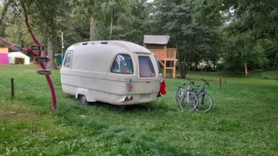 Pitch: Vehicle + Tent or Vehicle + Caravan - with electricity -