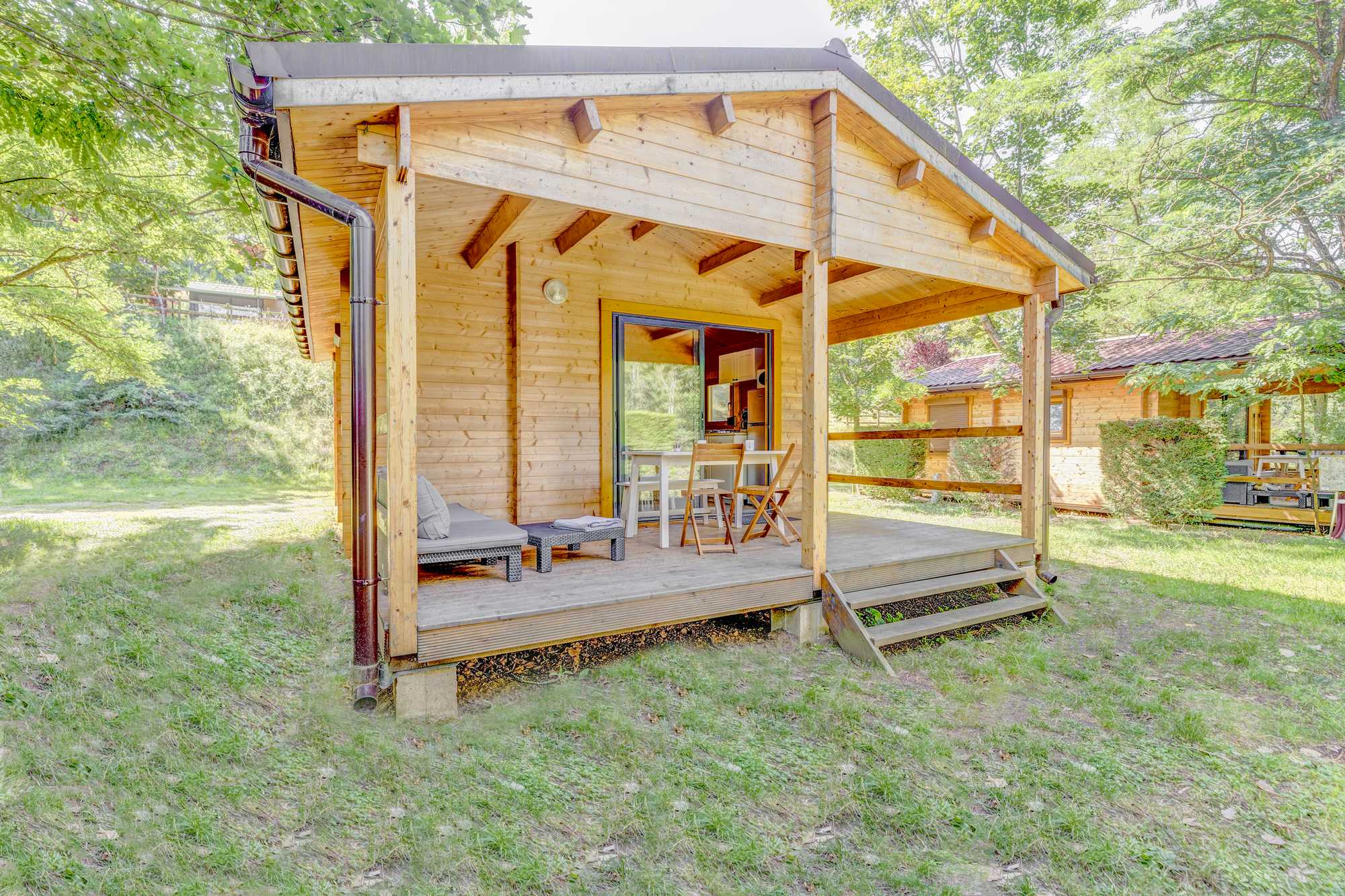 Location - Chalet Green Cottage Tout En Bois , 4 Personnes, 2 Chambres. Salon De Jardin - Camping Sites et Paysages L'Oasis